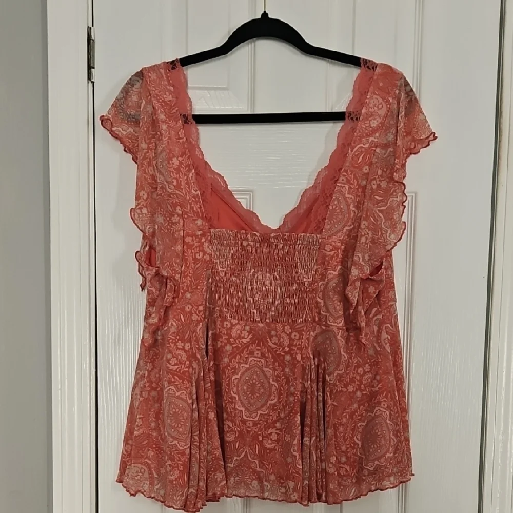 Torrid Pink Flutter Sleeve Smocked Peplum Top - Picture 8 of 12